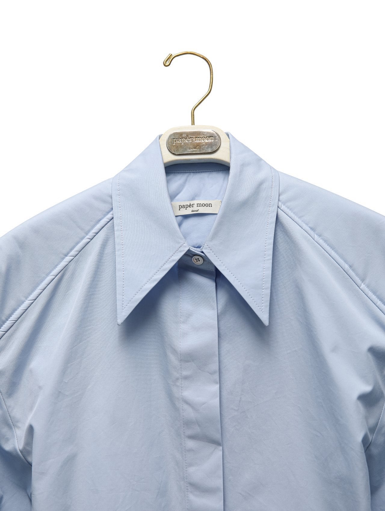 Приталена блакитна сорочка 