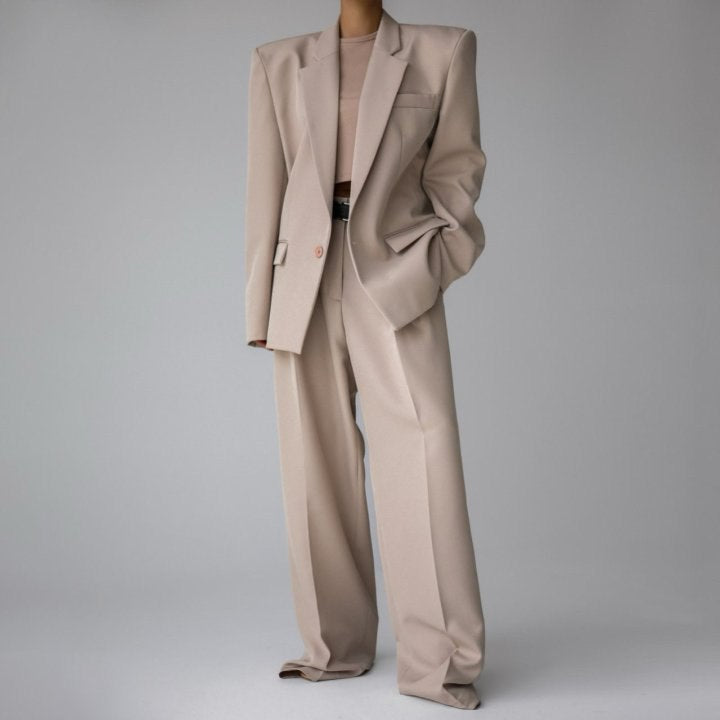 Брюки бежевого кольору 